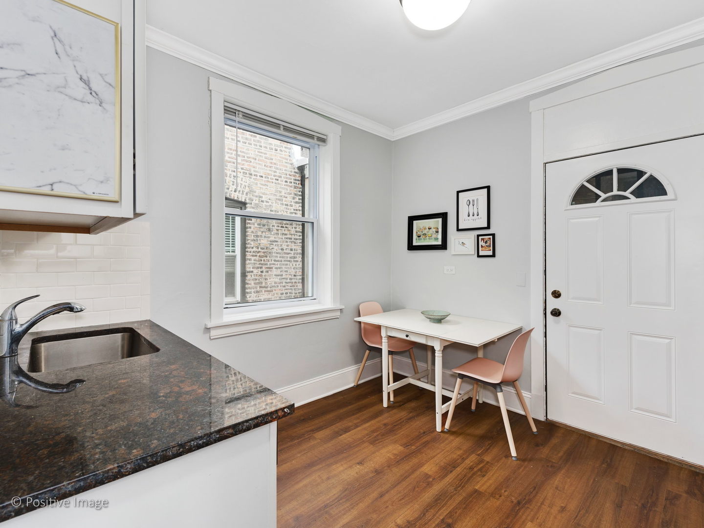 604 West Patterson Avenue, Unit 3A Chicago, IL 60613 - Photo 10 of 11 a kitchen with sink and window