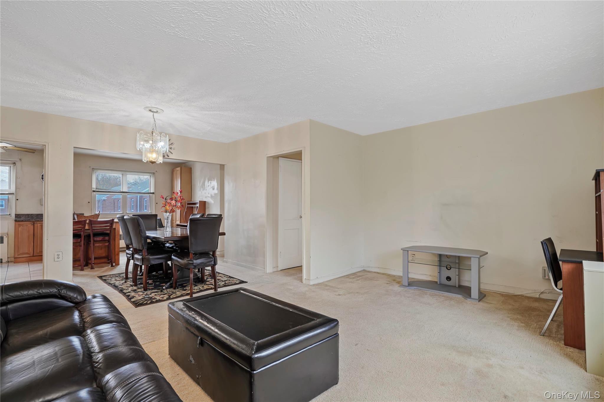 155-27 89th Street, Unit 27 Queens, NY 11414 - Photo 10 of 26 a living room with furniture