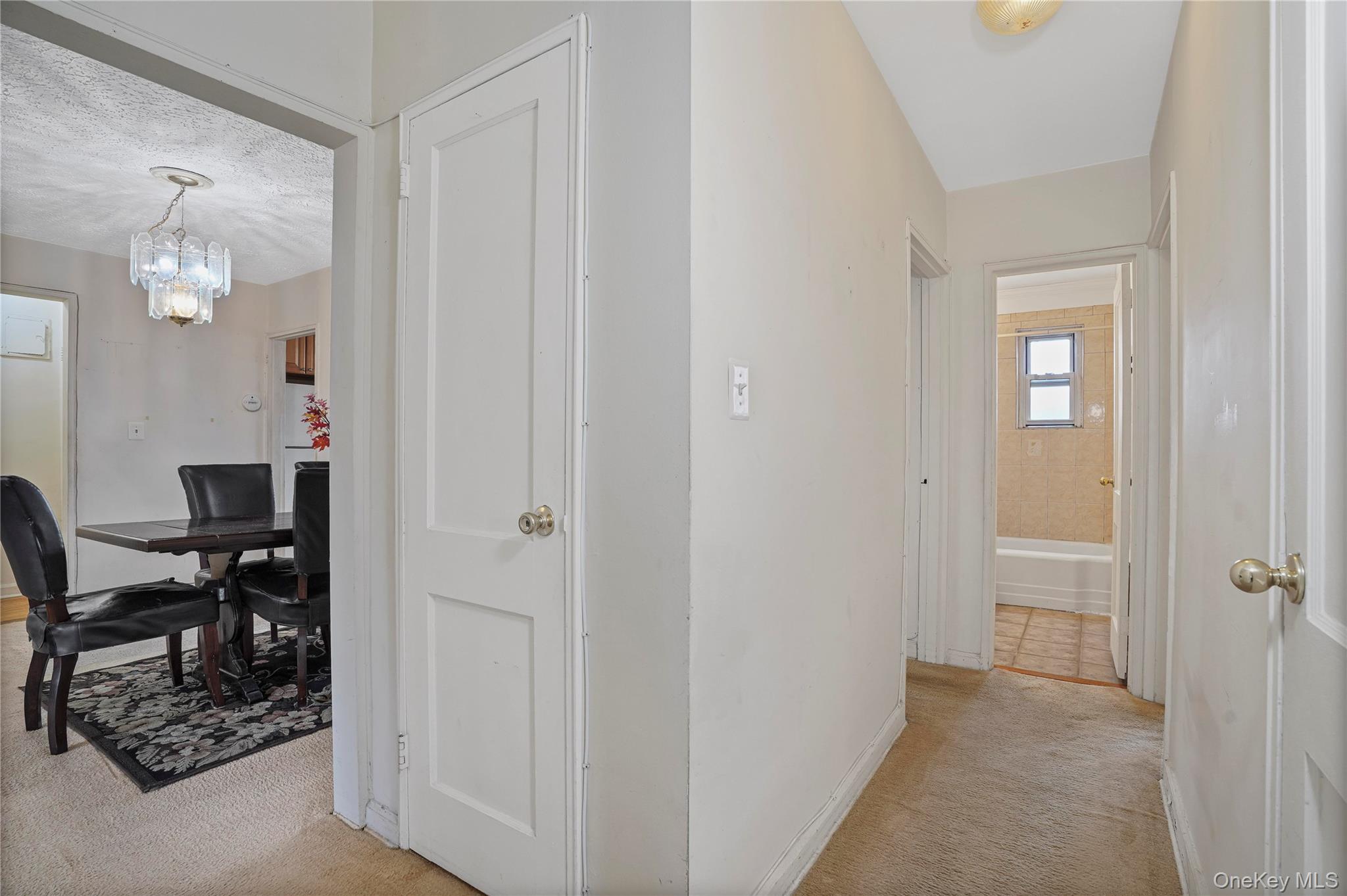 155-27 89th Street, Unit 27 Queens, NY 11414 - Photo 20 of 26 a view of entryway with livingroom and furniture