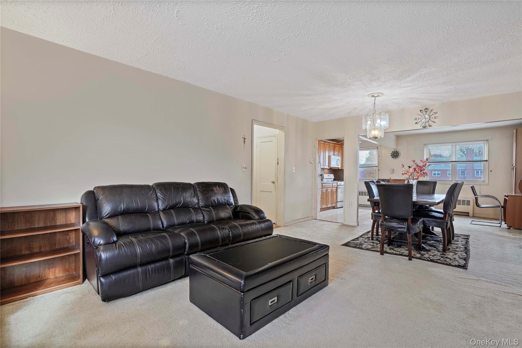 155-27 89th Street, Unit 27 Queens, NY 11414 - Photo 6 of 26 a living room with furniture