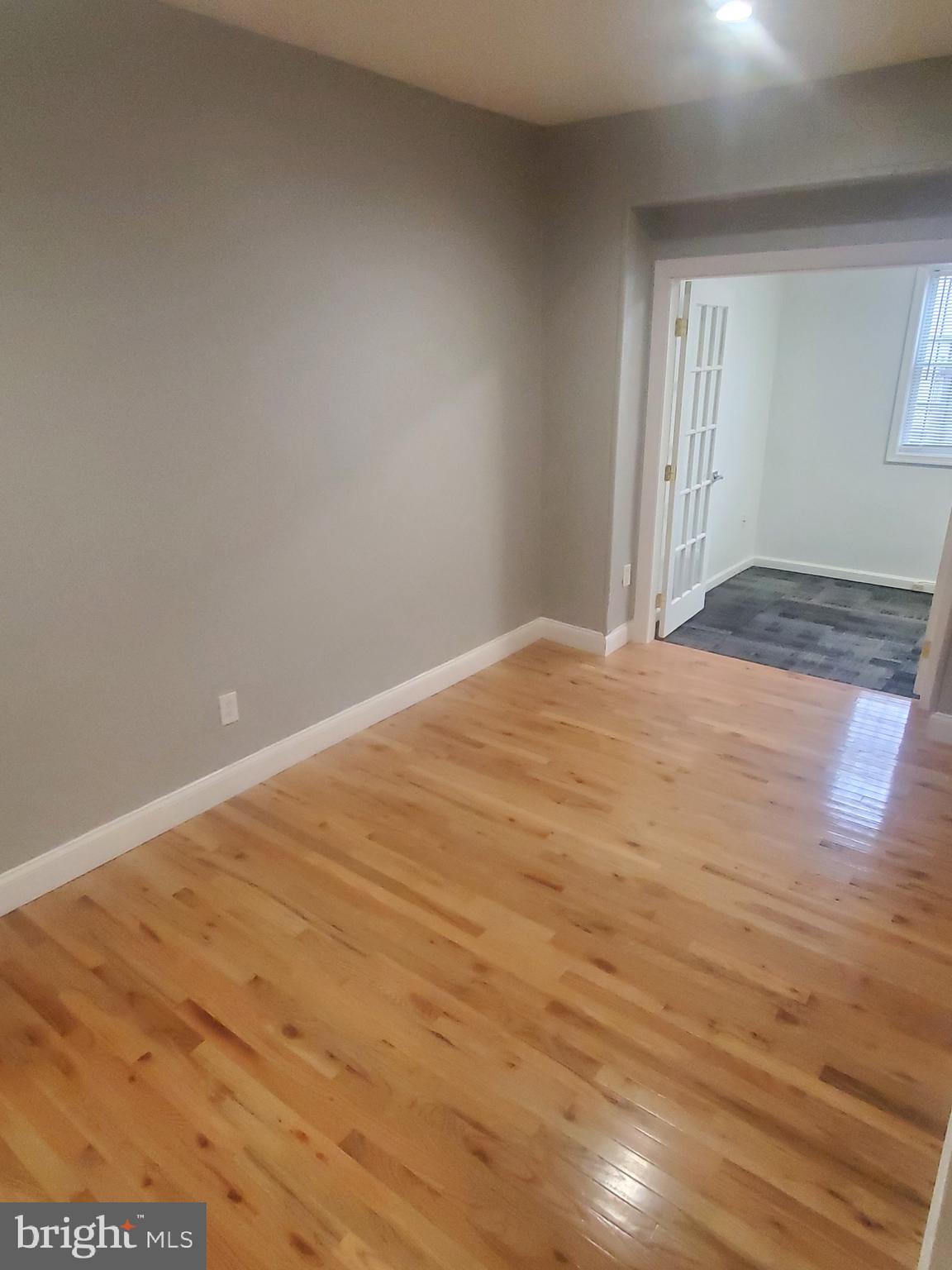 1122 Penn Street Northeast, Unit 1 Washington, DC 20002 - Photo 21 of 31 a view of empty room with wooden floor