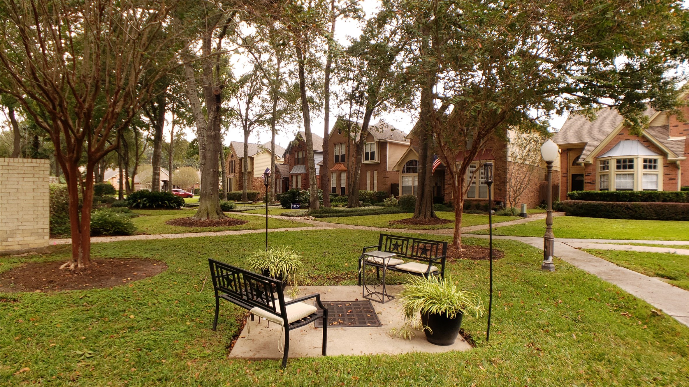 a swimming pool with outdoor seating and yard