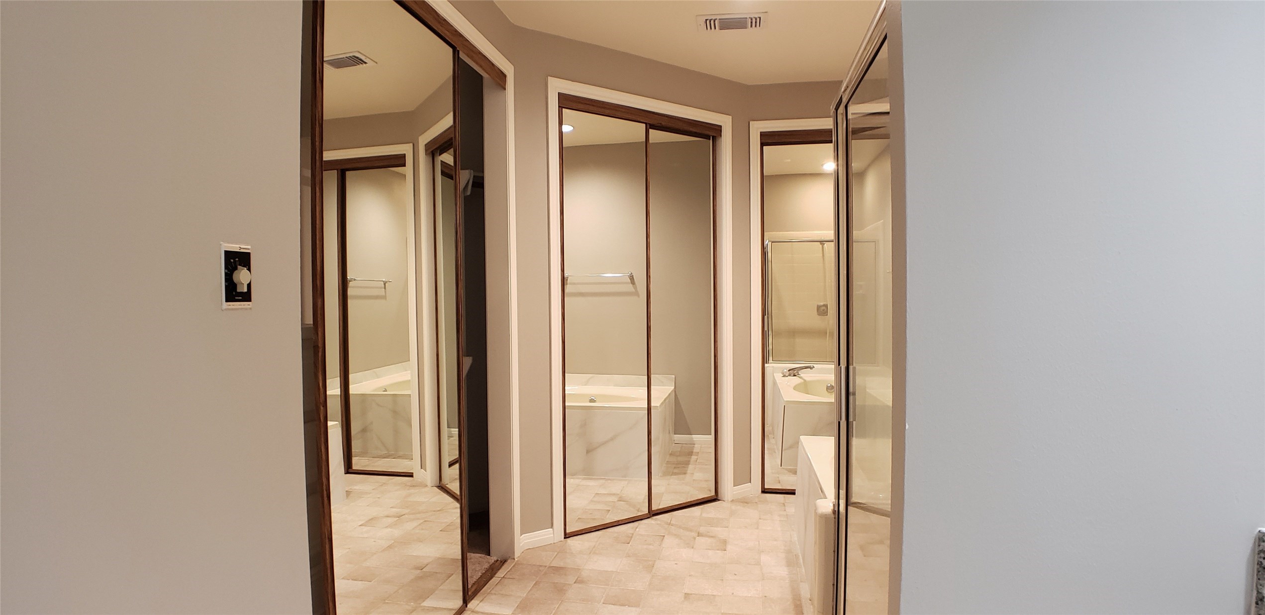 6607 Tournament Drive Houston, TX 77069 - Photo 22 of 46 a view of a bathroom with sliding glass door and shower