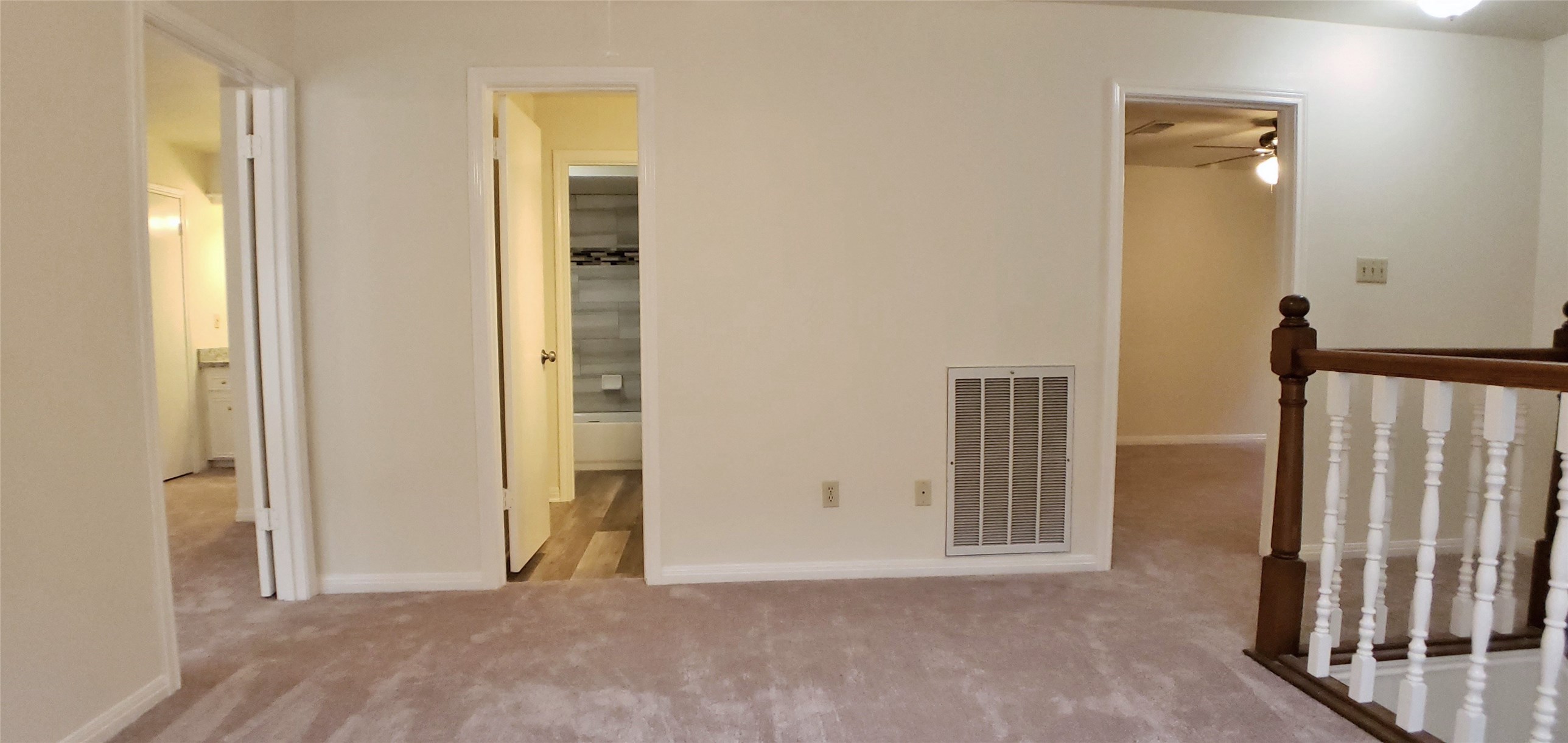 6607 Tournament Drive Houston, TX 77069 - Photo 25 of 46 an empty room with wooden floor and a bathroom