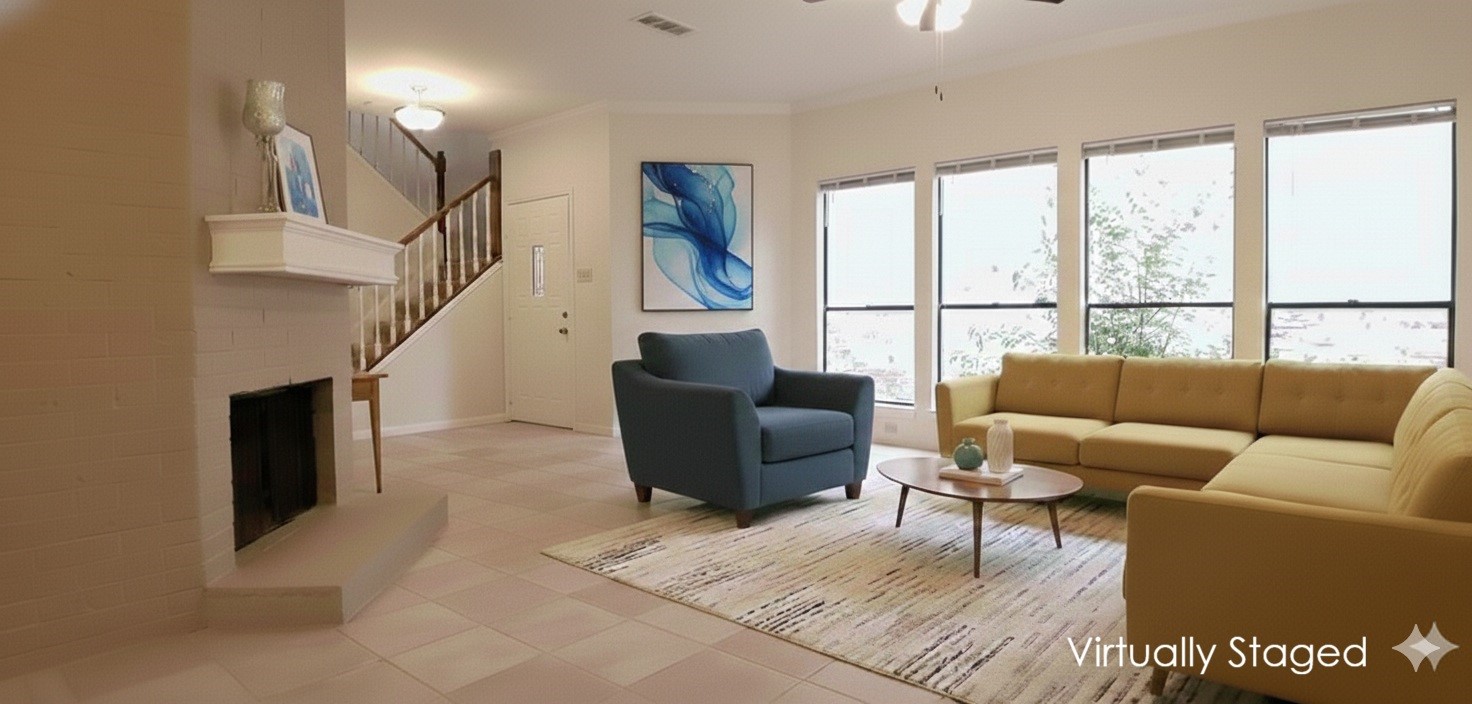 6607 Tournament Drive Houston, TX 77069 - Photo 5 of 46 a living room with furniture a large window and a flat screen tv