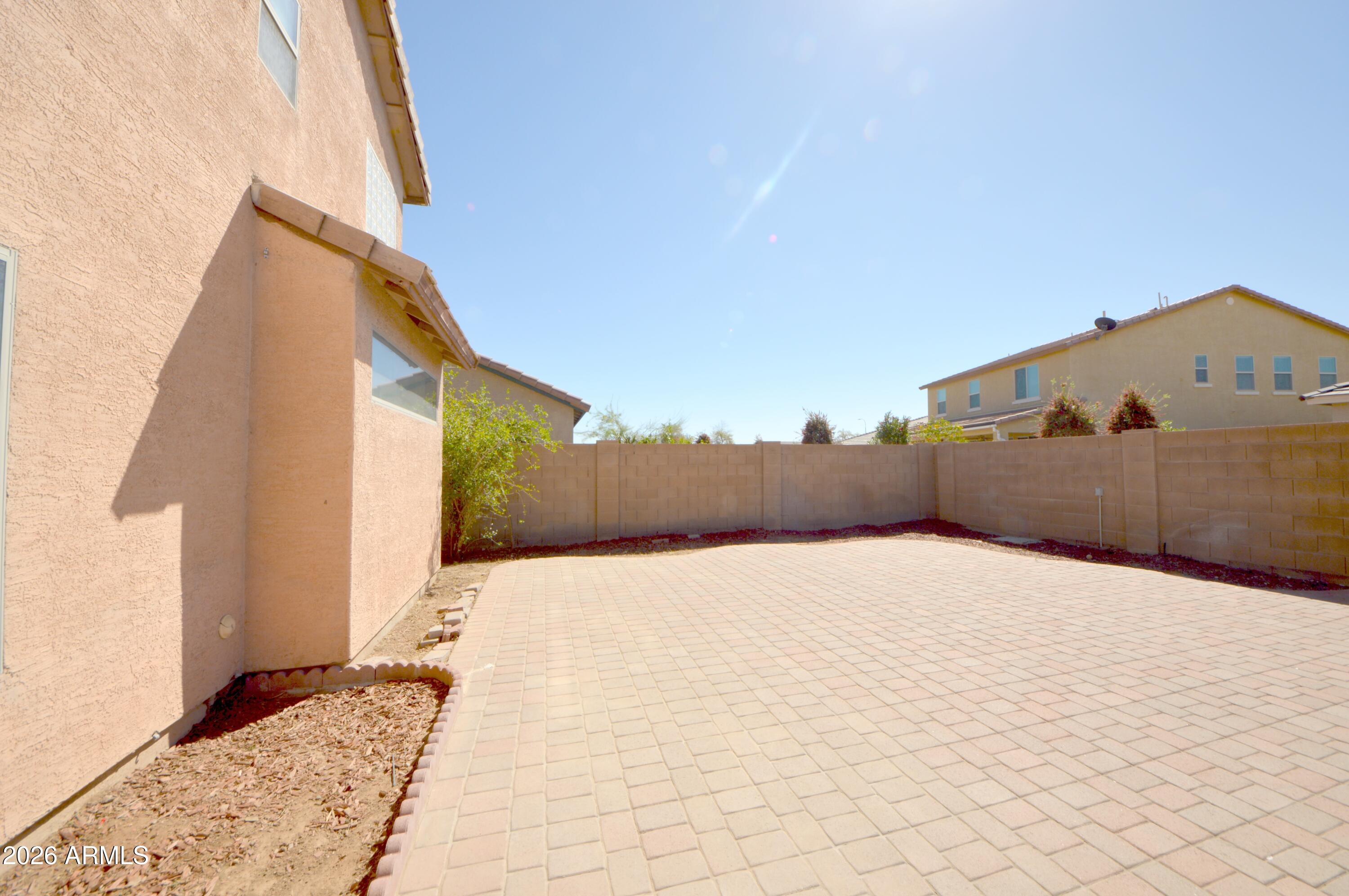 5115 West Novak Way Laveen, AZ 85339 - Photo 45 of 52 Backyard Left Side with Pa\vers
