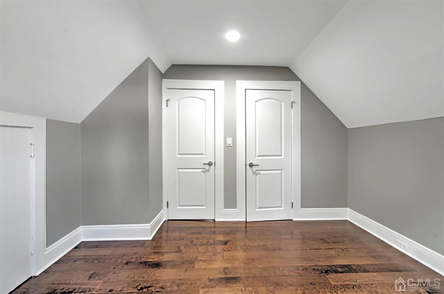 80 North Hill Road Colonia, NJ 07067 - Photo 16 of 23 an empty room with wooden floor and closet
