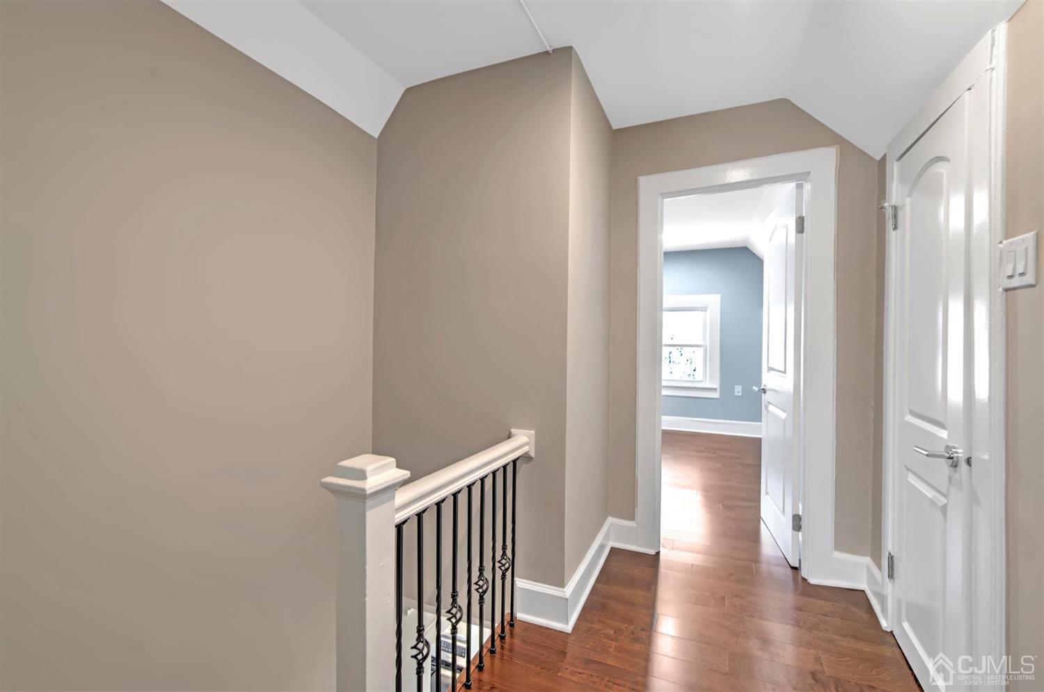80 North Hill Road Colonia, NJ 07067 - Photo 19 of 23 a view of a hallway with wooden floor