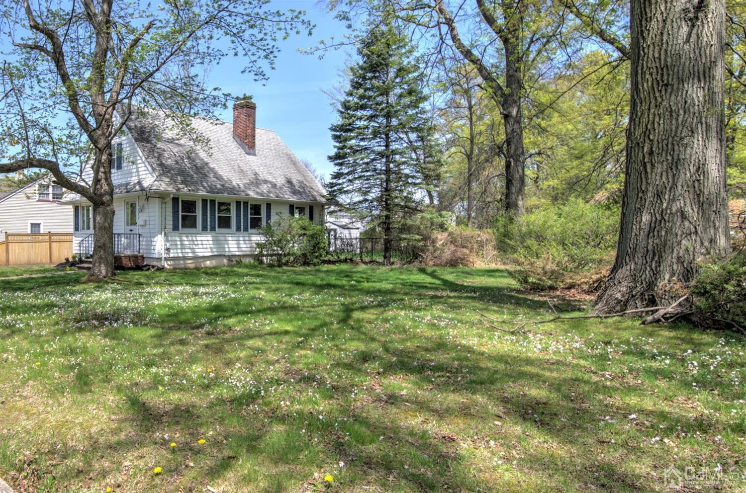 80 North Hill Road Colonia, NJ 07067 - Photo 21 of 23 a view of house with backyard