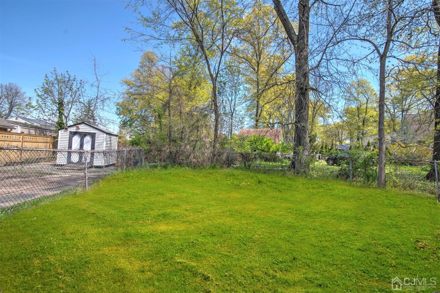 80 North Hill Road Colonia, NJ 07067 - Photo 22 of 23 a view of a house with a yard