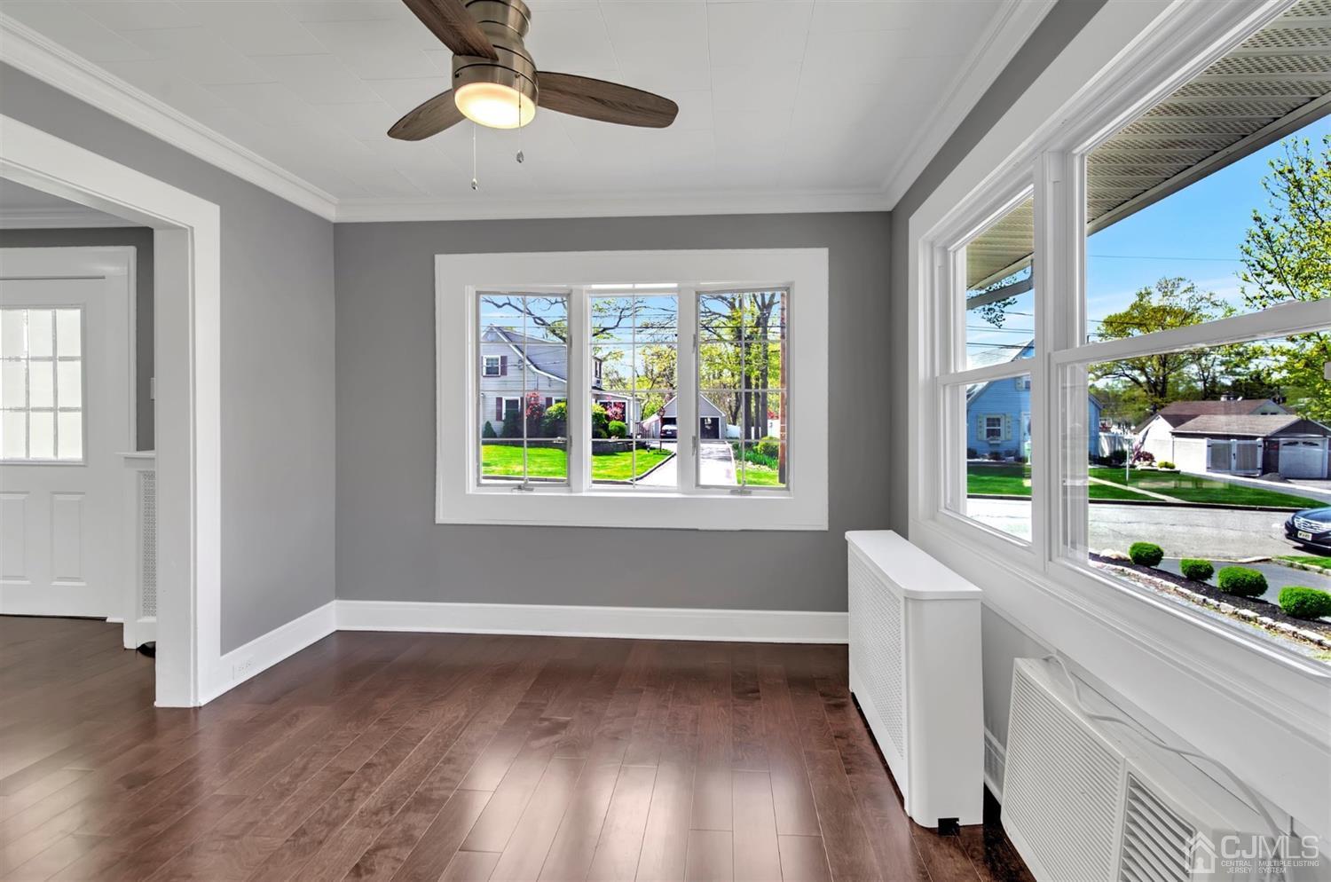 80 North Hill Road Colonia, NJ 07067 - Photo 6 of 23 wooden floor in an empty room with a window