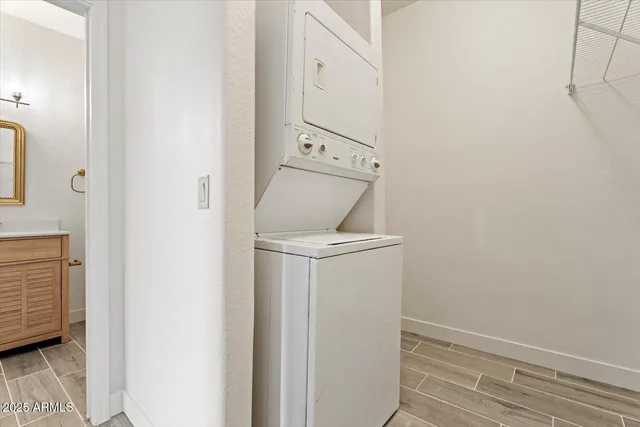 a view of a storage & utility room with washer and dryer