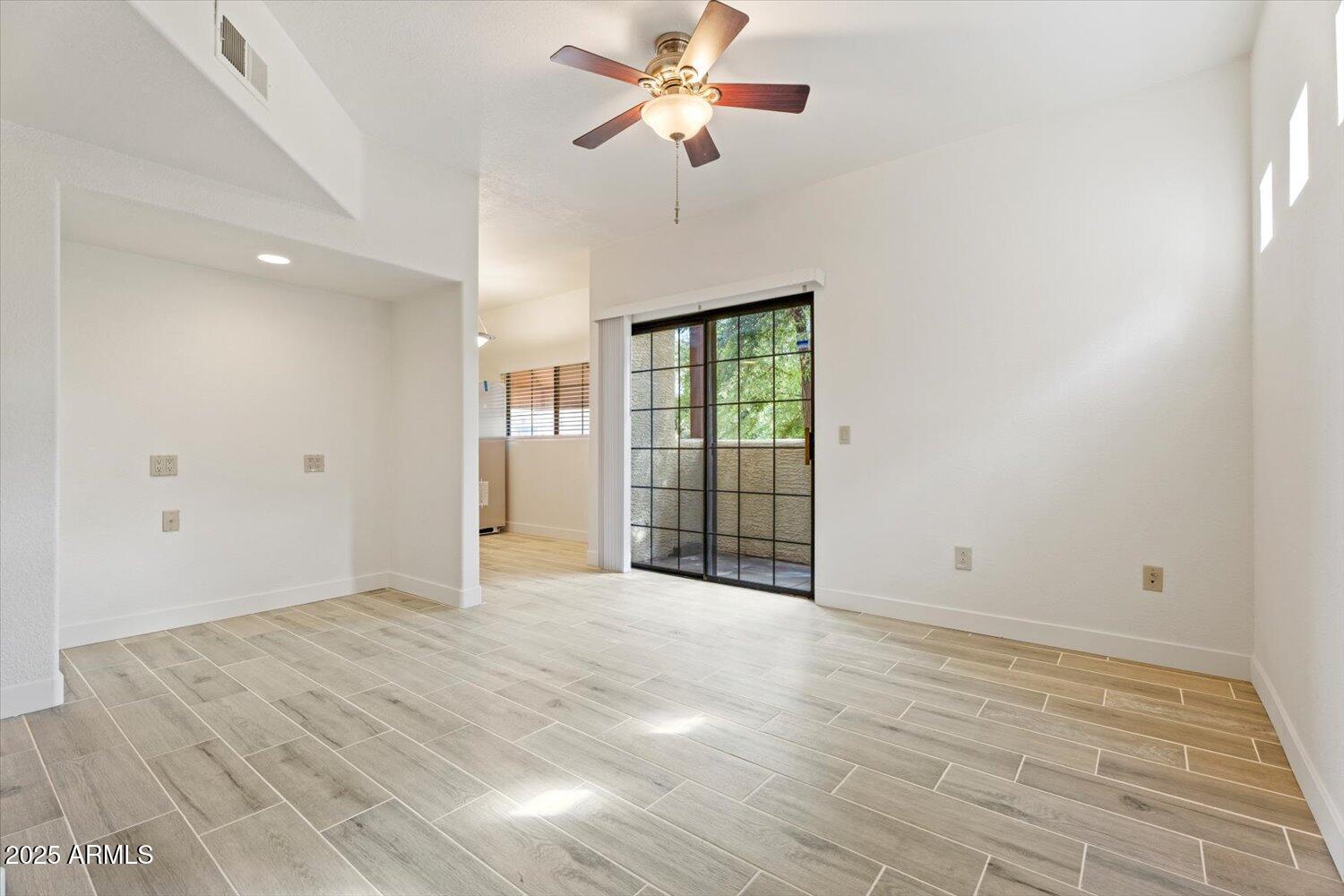 3434 East Baseline Road, Unit 260 Phoenix, AZ 85042 - Photo 5 of 15 a view of an empty room with a window