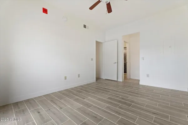 a view of a room with an empty space