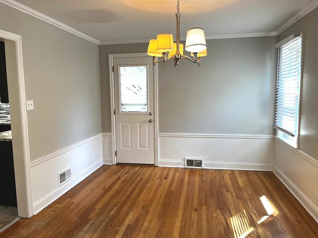 17107 Longfellow Avenue Hazel Crest, IL 60429 - Photo 13 of 21 a view of empty room with wooden floor and fan