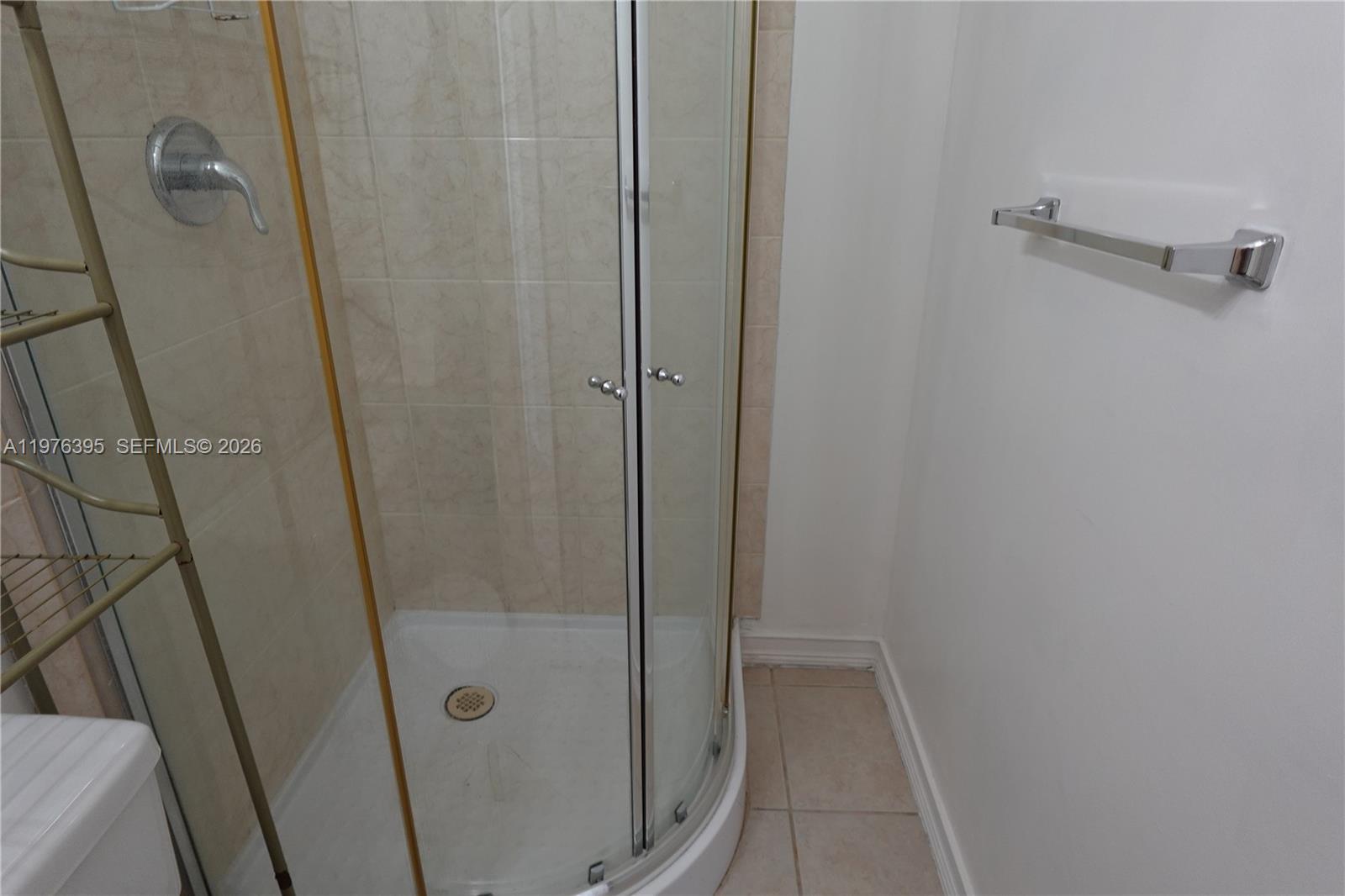 11262 Southwest 74th Street Miami, FL 33173 - Photo 19 of 19 a bathroom with a shower