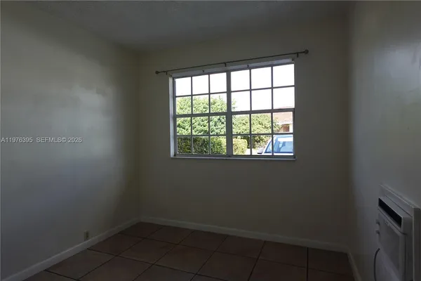 an empty room with a window