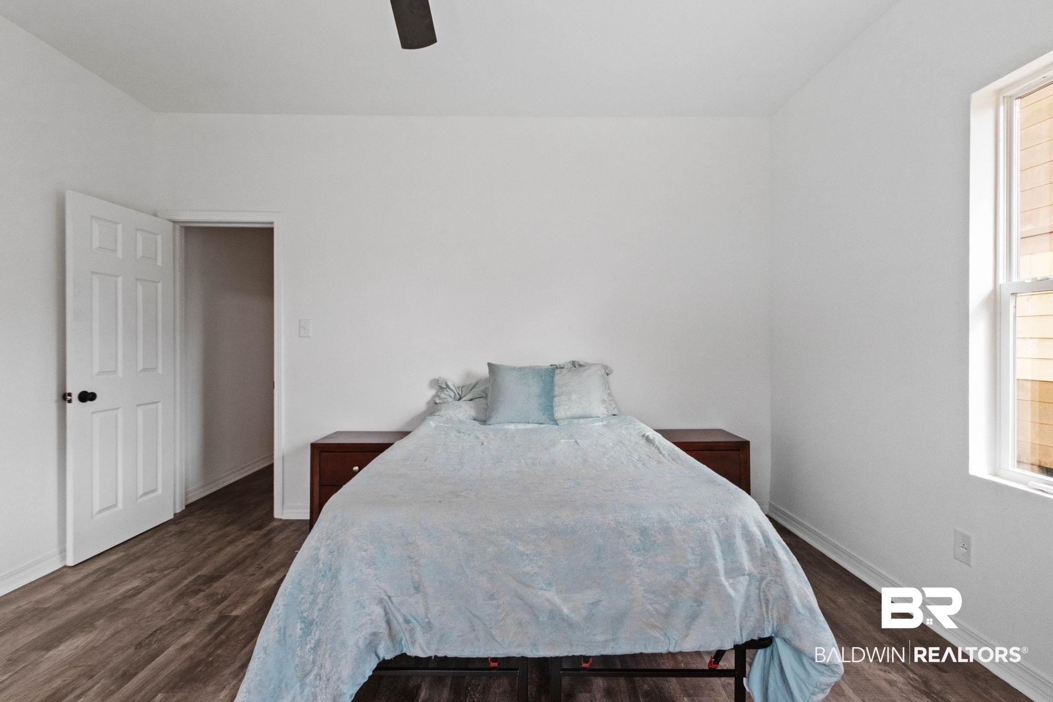 128 Bush Avenue Mobile, AL 36604 - Photo 29 of 40 Bedroom with ceiling fan and dark wood-style floors