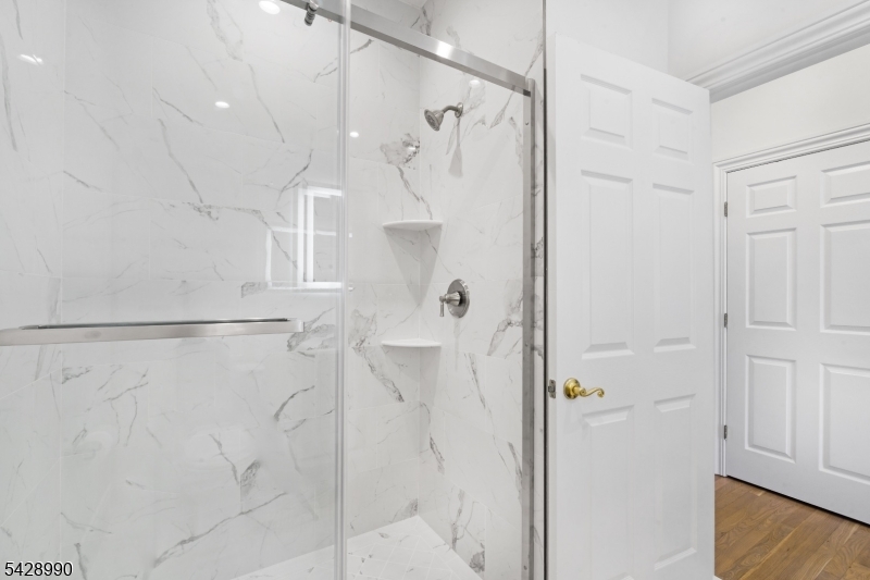 13 Main Street, Unit 3 Sparta, NJ 07871 - Photo 6 of 9 a bathroom with a shower