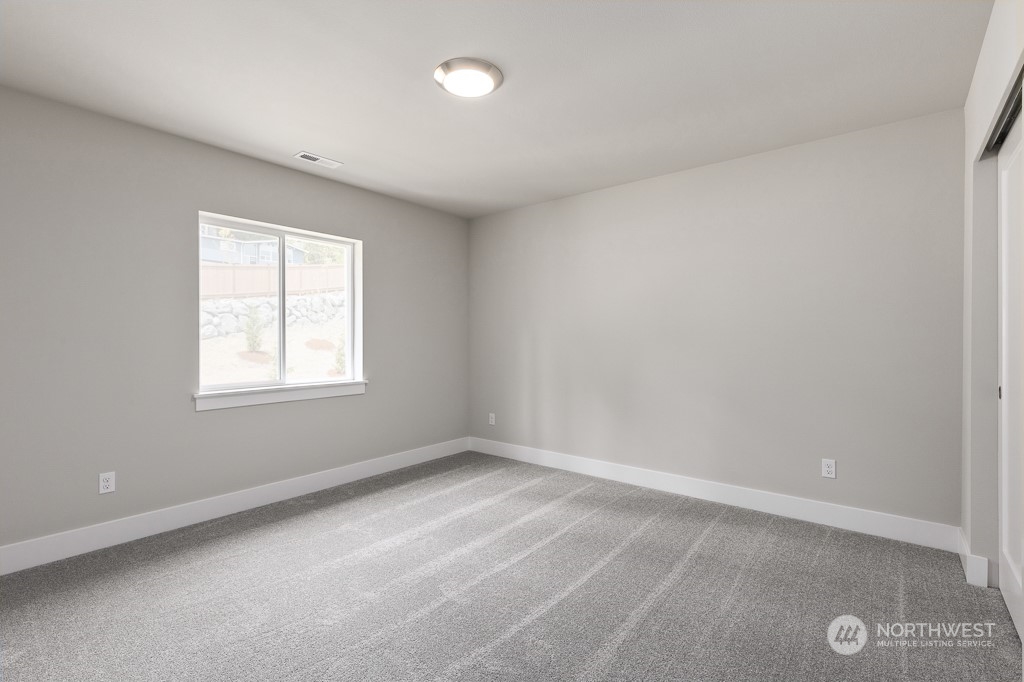 2014 228th Place Southwest, Unit EP 48 Bothell, WA 98021 - Photo 15 of 19 an empty room with a window