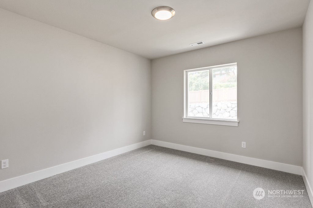 2014 228th Place Southwest, Unit EP 48 Bothell, WA 98021 - Photo 16 of 19 an empty room with a window