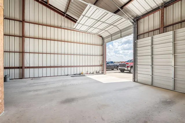 a view of a lake with a big yard