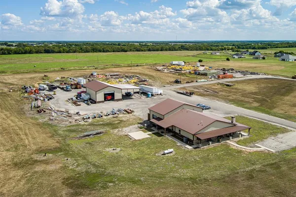 swimming pool view with a lake view
