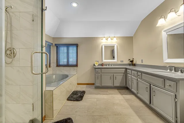 a kitchen with a sink a counter and cabinets