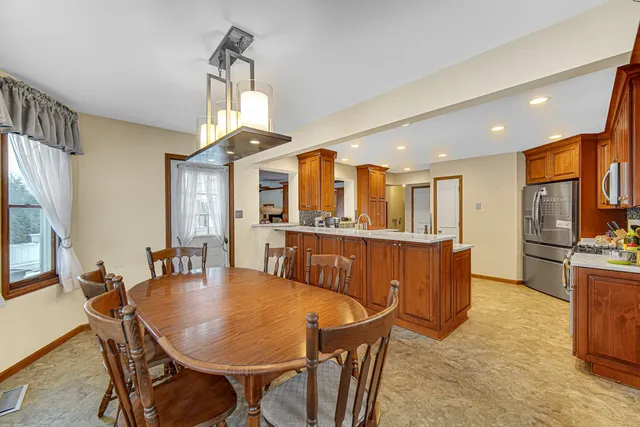 a view of a dining room with furniture