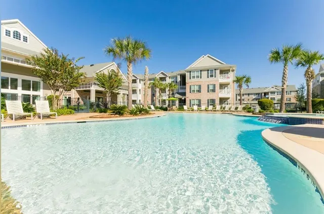 a view of a water fountain in front of the house