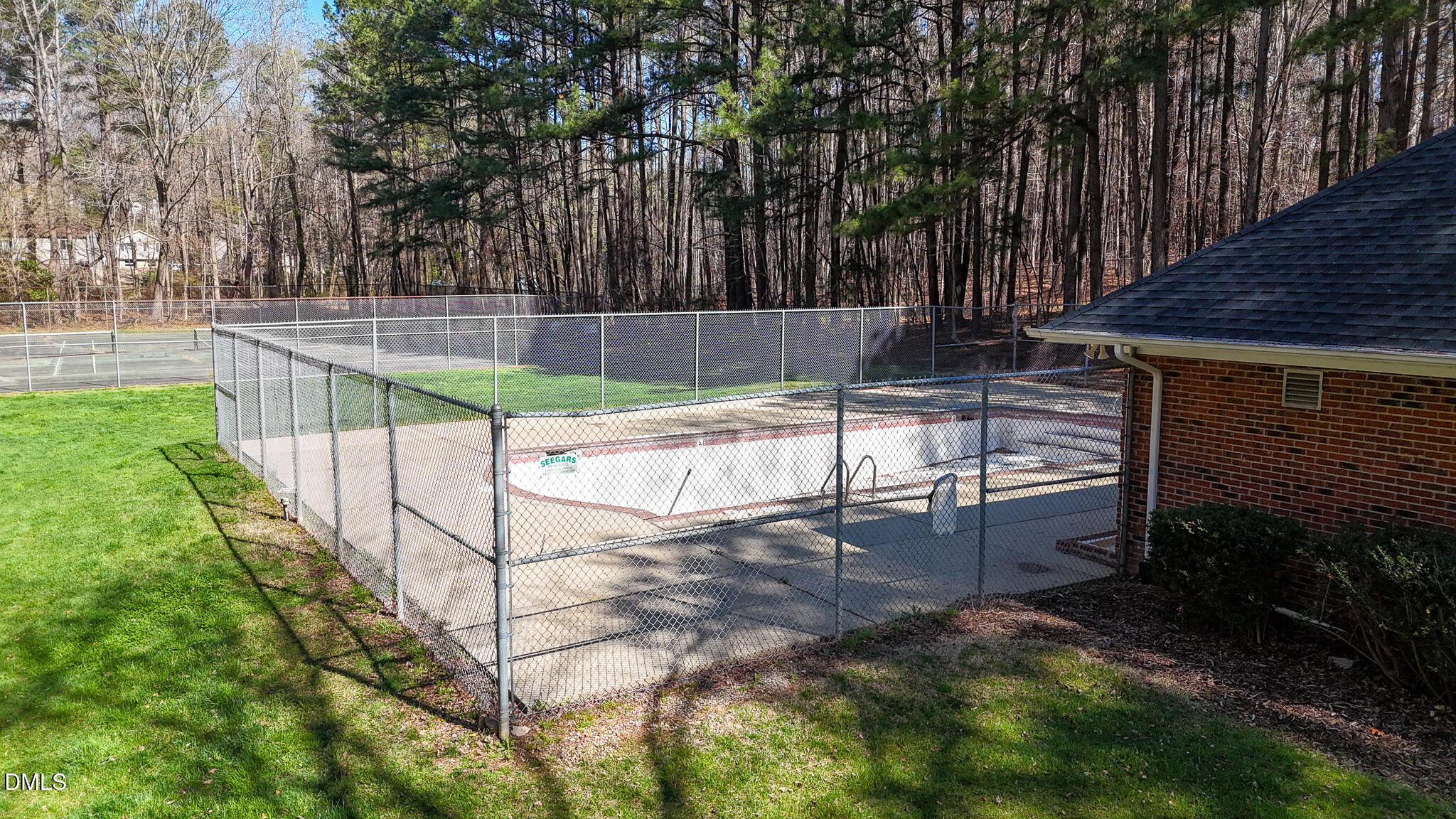 213 Bracken Court Raleigh, NC 27615 - Photo 17 of 20 a view of a backyard