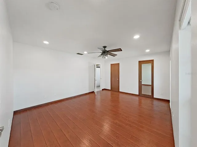 a bathroom with double vanity sinks double vanity tub and mirror