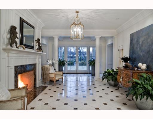 Undisclosed Address Greenwich, CT 06830 - Photo 3 of 10 a living room with furniture a fireplace and a chandelier