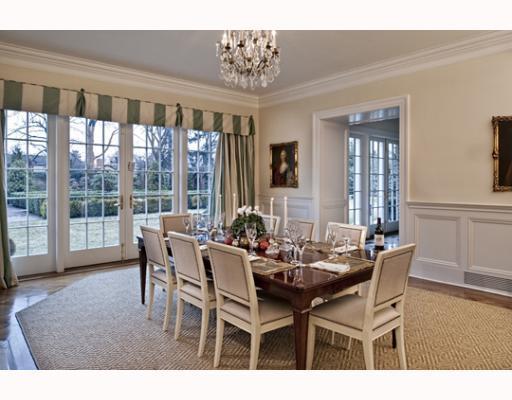 Undisclosed Address Greenwich, CT 06830 - Photo 5 of 10 a dining room with furniture a chandelier and wooden floor
