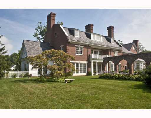 Undisclosed Address Greenwich, CT 06830 - Photo 8 of 10 a front view of house with yard and green space