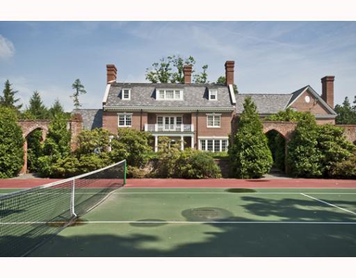 Undisclosed Address Greenwich, CT 06830 - Photo 10 of 10 a view of a big building with a big yard and potted plants