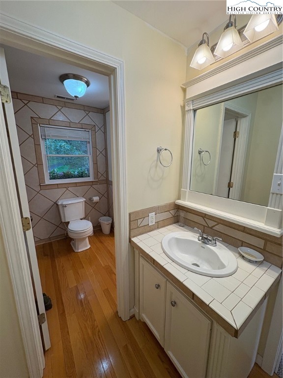 638 Ridge Road Glade Valley, NC 28627 - Photo 18 of 35 a bathroom with a sink and a mirror
