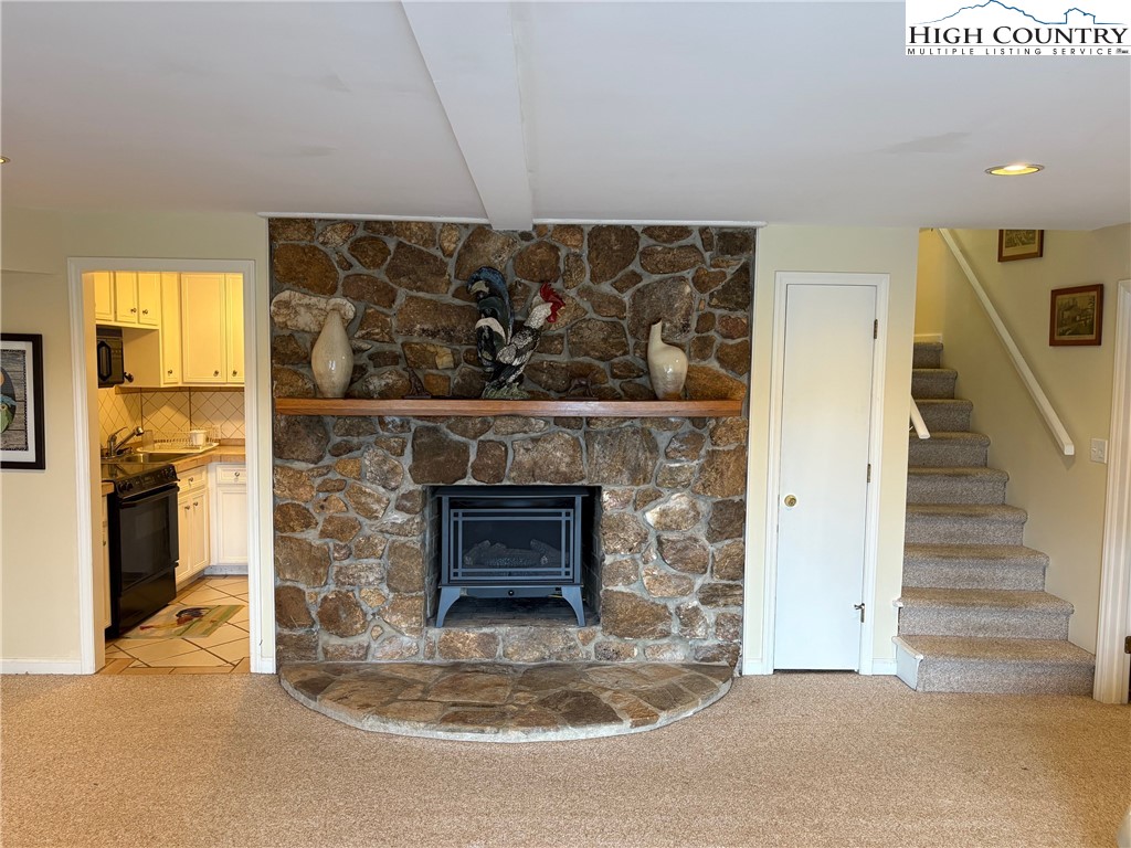 638 Ridge Road Glade Valley, NC 28627 - Photo 20 of 35 a room with fireplace