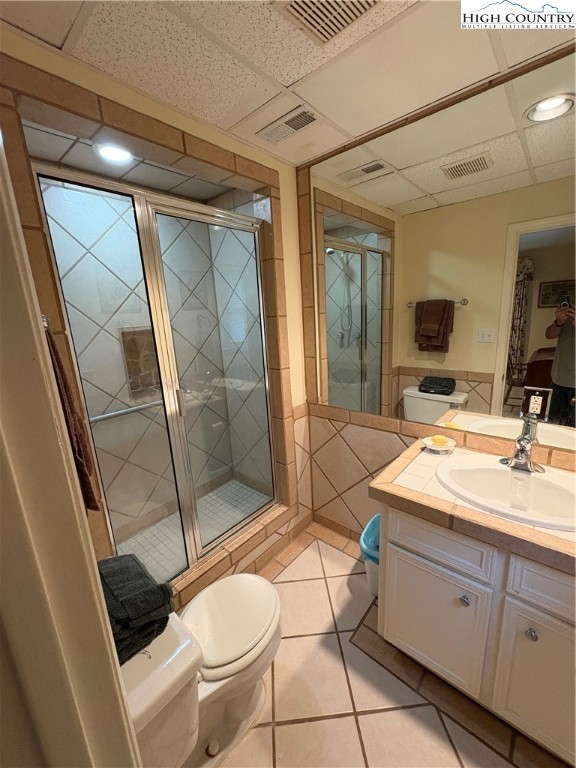 638 Ridge Road Glade Valley, NC 28627 - Photo 24 of 35 a spacious bathroom with a granite countertop sink toilet and shower