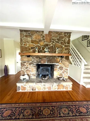 a living room with furniture or couch and a window