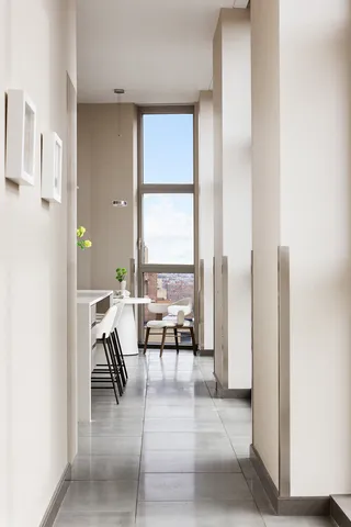 a kitchen with stainless steel appliances a sink stove and cabinets