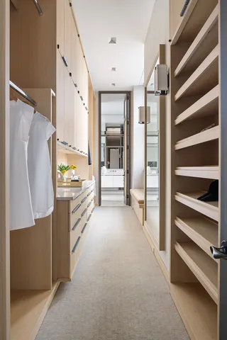 a bathroom with a double vanity sink and mirror