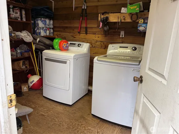 a utility room with dryer and washer
