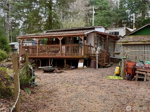 a view of house with outdoor seating space