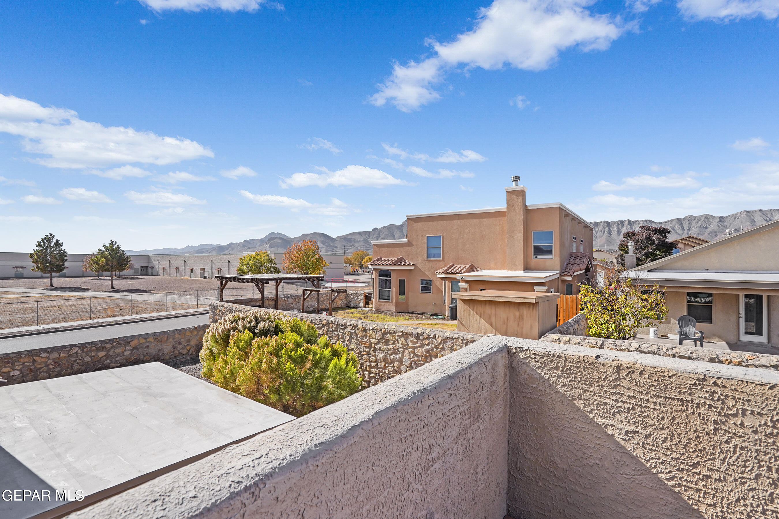 11265 Cattle Ranch Street El Paso, TX 79934 - Photo 31 of 44 a view of a terrace with lawn chairs
