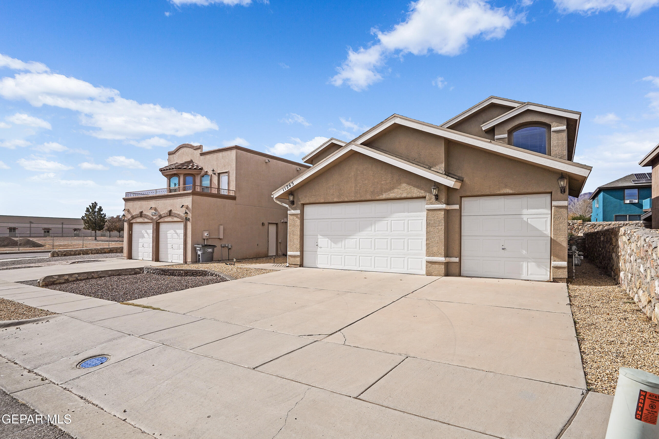 11265 Cattle Ranch Street El Paso, TX 79934 - Photo 36 of 44 a white house with a outdoor space