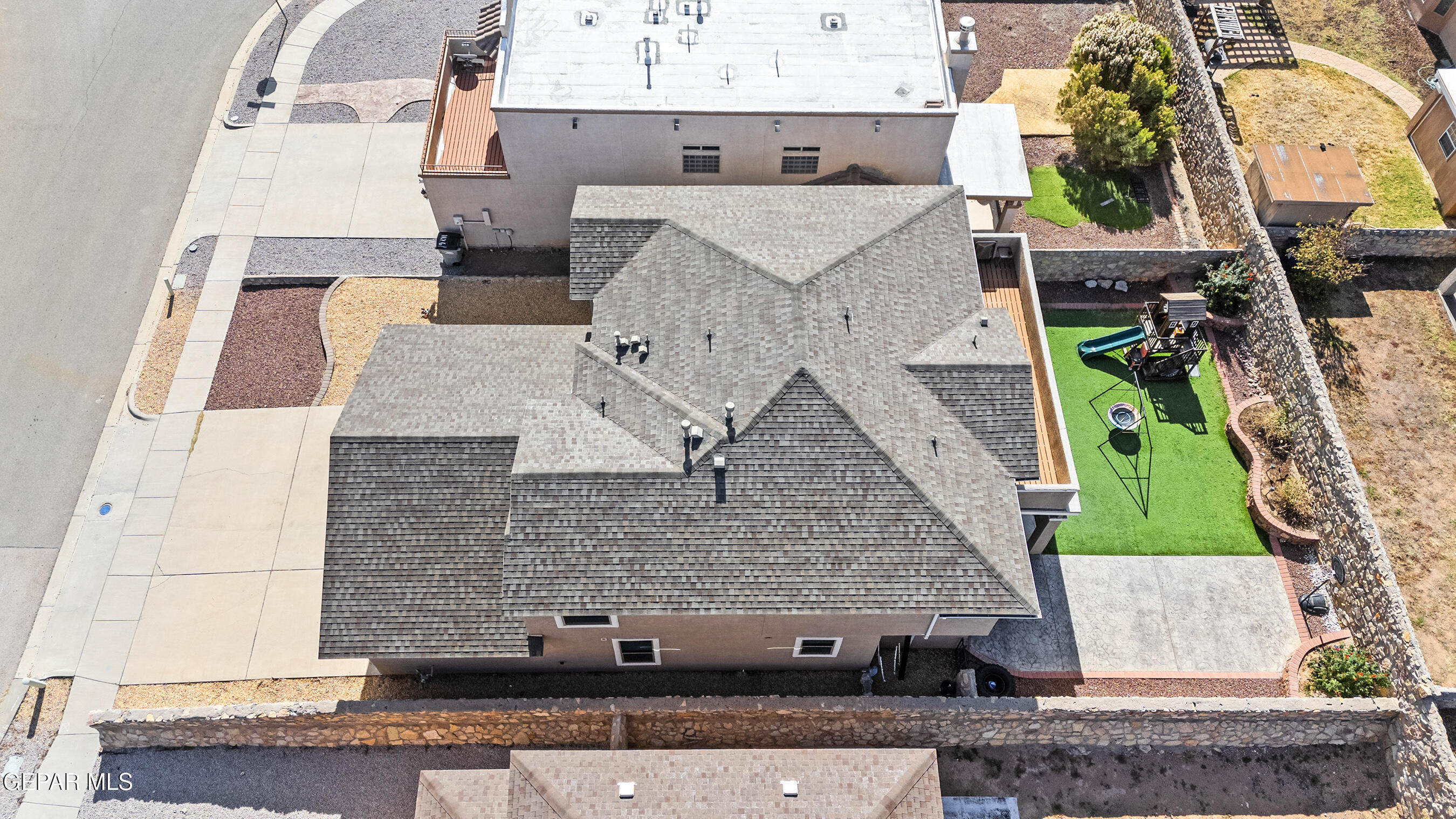 11265 Cattle Ranch Street El Paso, TX 79934 - Photo 39 of 44 an aerial view of residential houses with outdoor space
