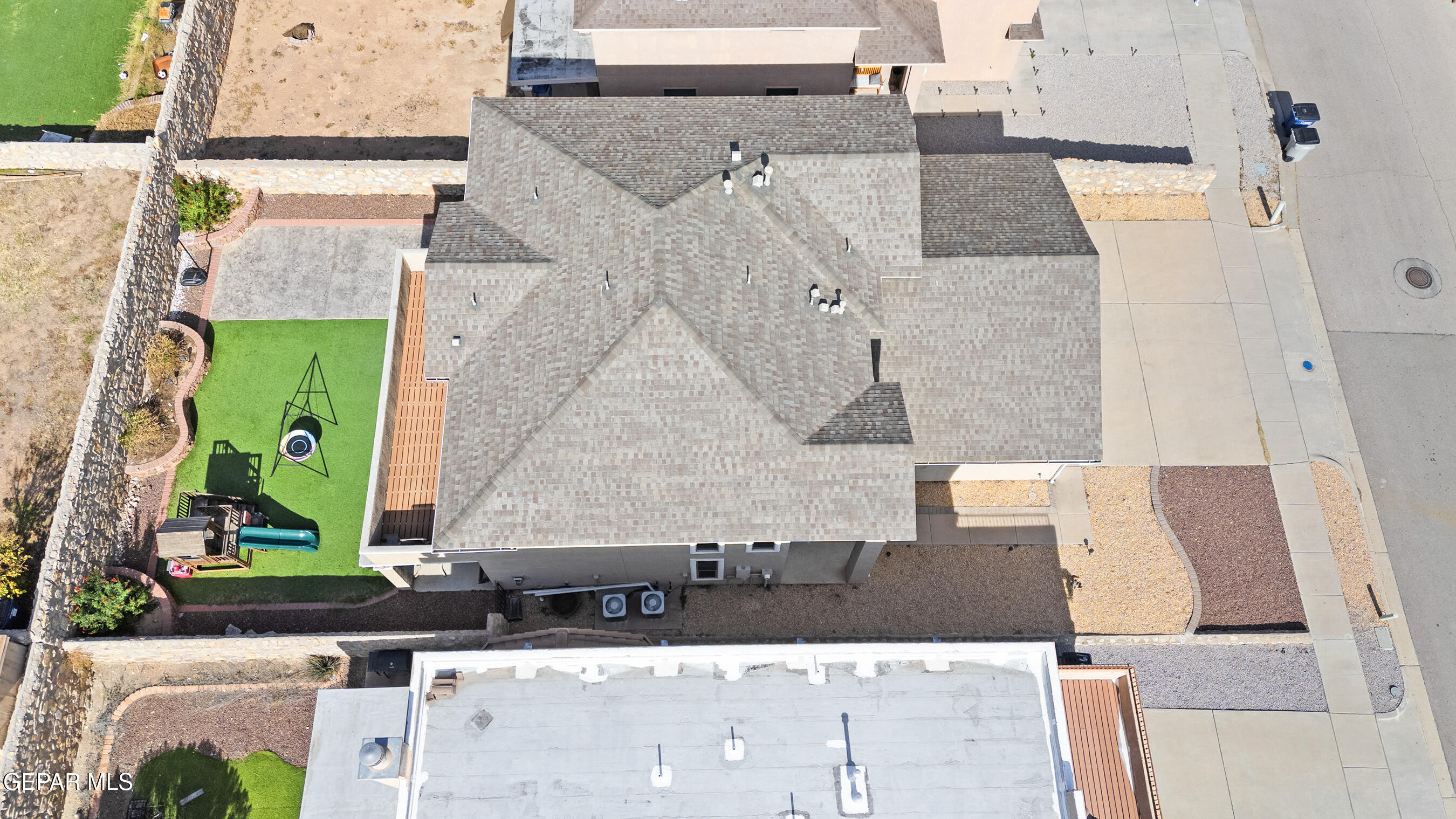 11265 Cattle Ranch Street El Paso, TX 79934 - Photo 41 of 44 an aerial view of a residential building with outdoor space