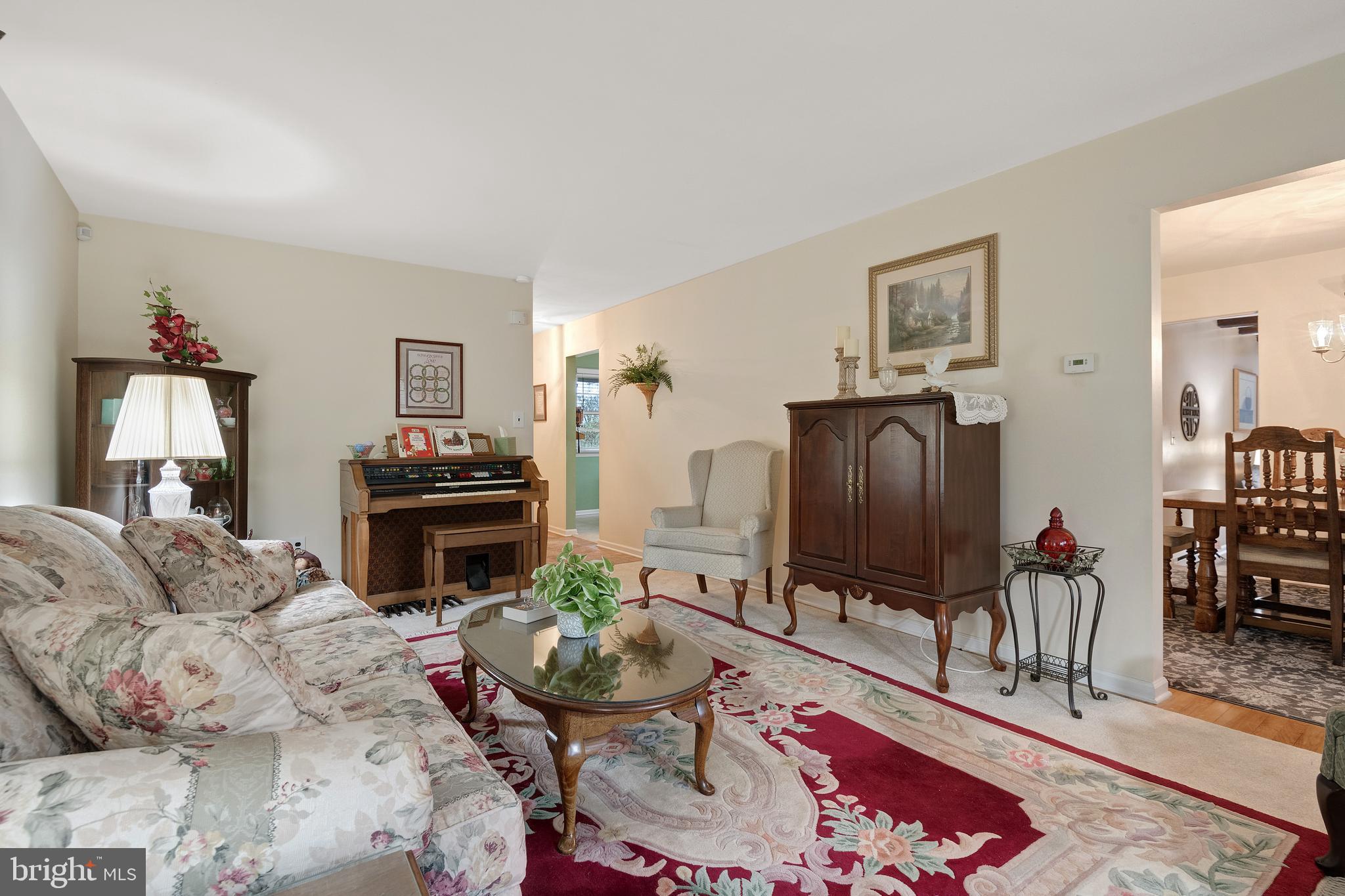 685 Chambers Rock Road Landenberg, PA 19350 - Photo 12 of 49 a living room with furniture and a flat screen tv