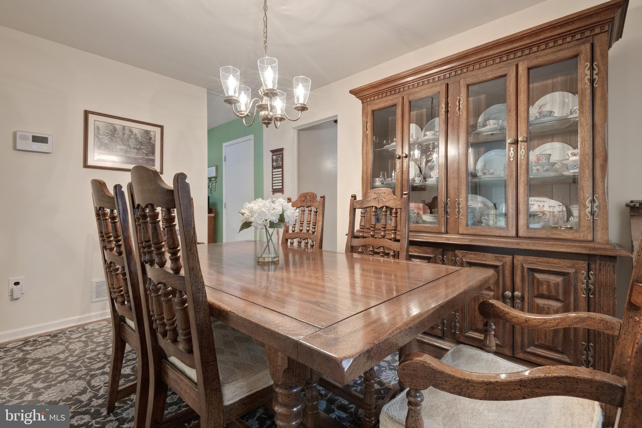 685 Chambers Rock Road Landenberg, PA 19350 - Photo 19 of 49 a dining room with furniture a chandelier and window